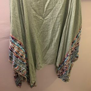 I guess you would call this a Shaw, no sleeves